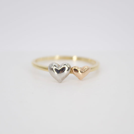 Anillo corazones en oro combinado 14k.