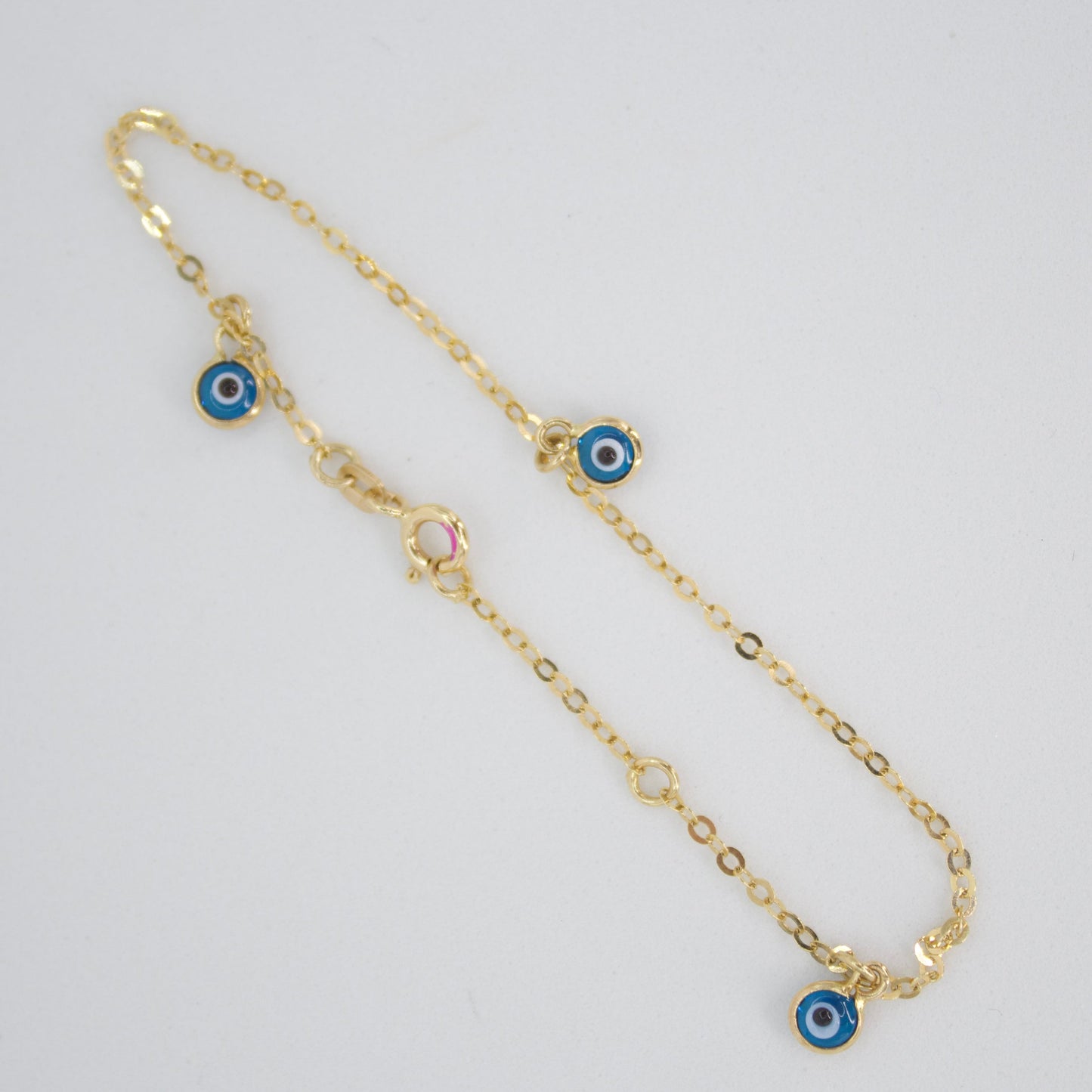 Pulsera ojo turcos en oro amarillo 14k.