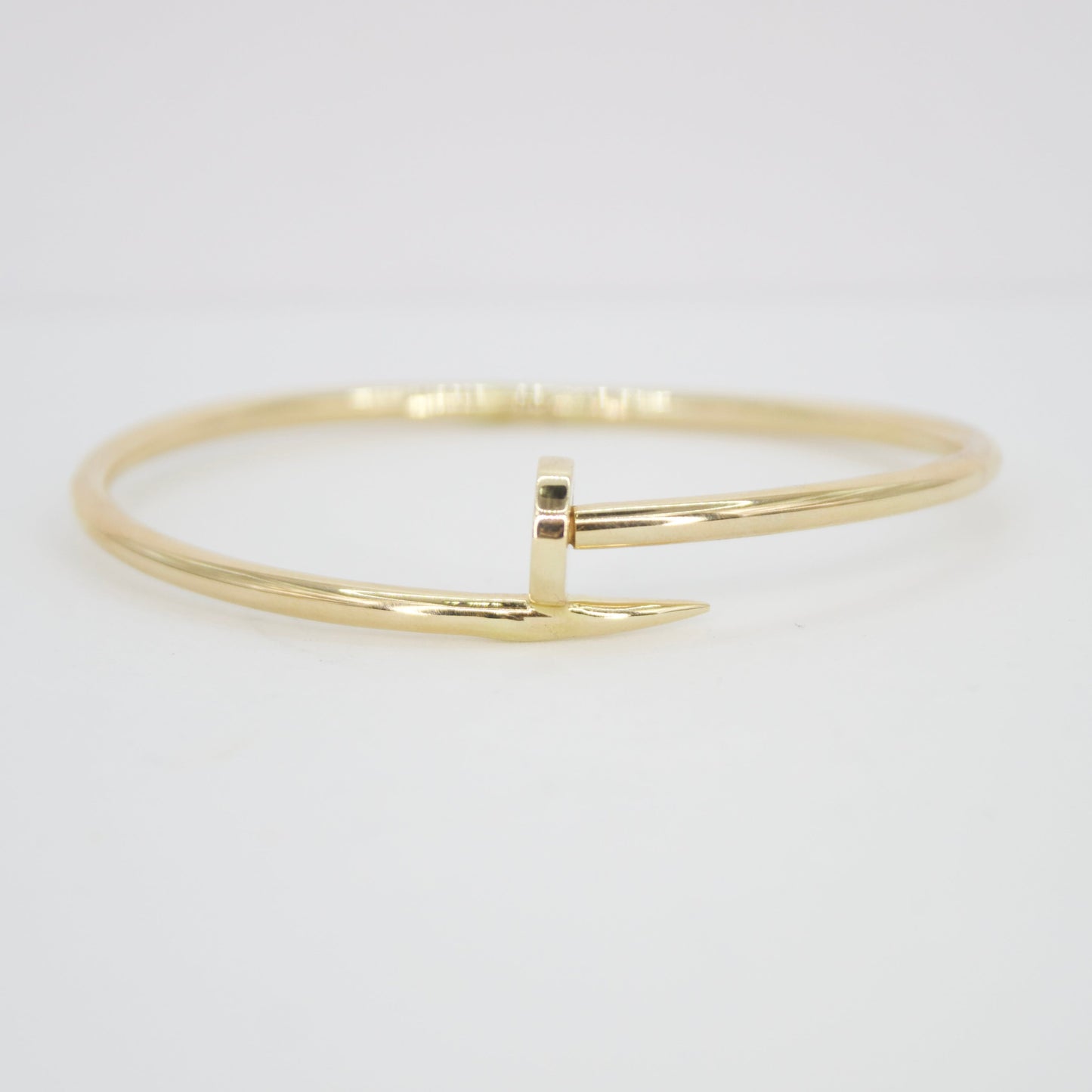 Brazalete tornillo en oro amarillo 14k.