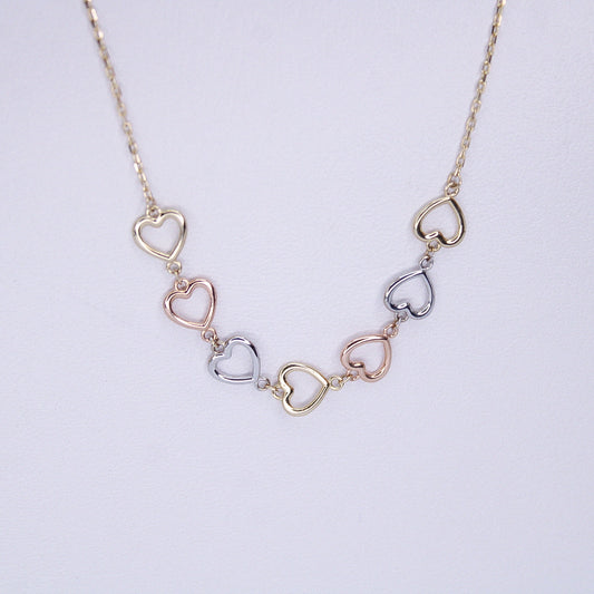 Gargantilla en oro combinado 14k con corazones.