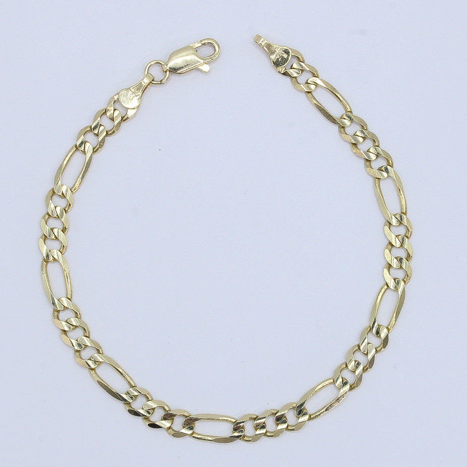 Pulso tejido 3x1 en oro amarillo 14k.