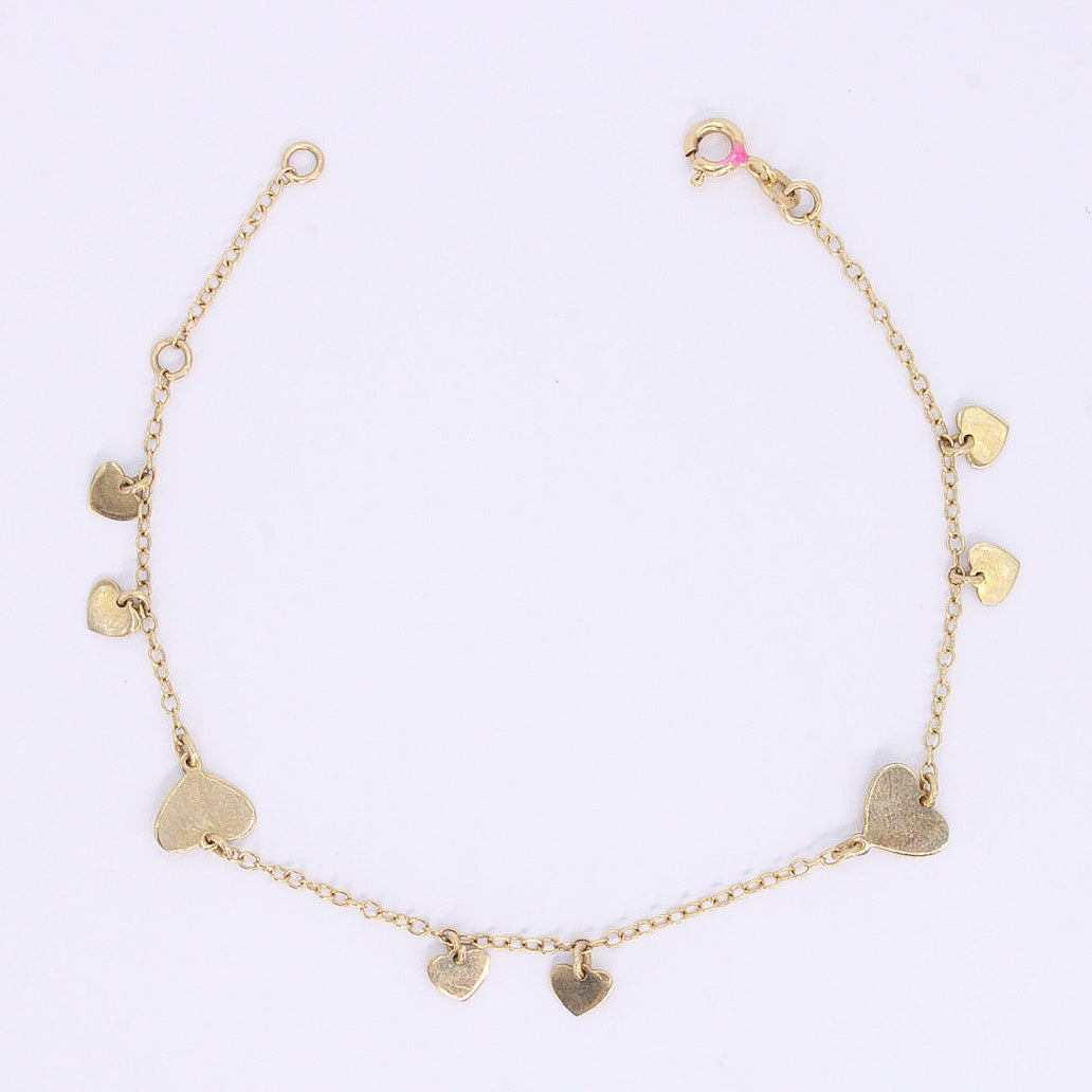 Pulsera de corazones oro amarillo 14k.