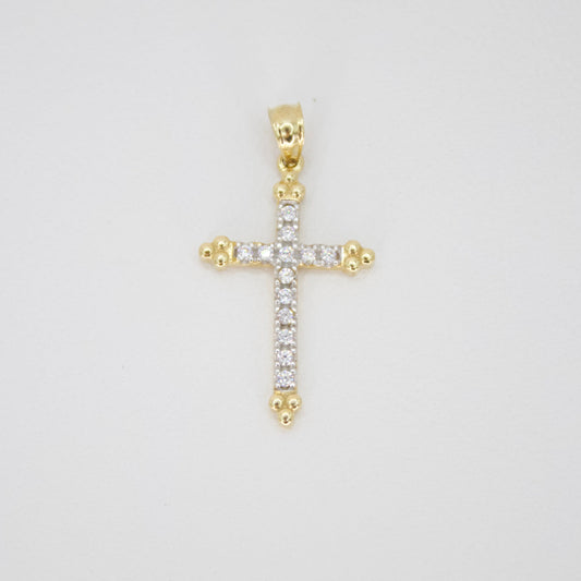 Cruz en oro amarillo 14k con zirconias.