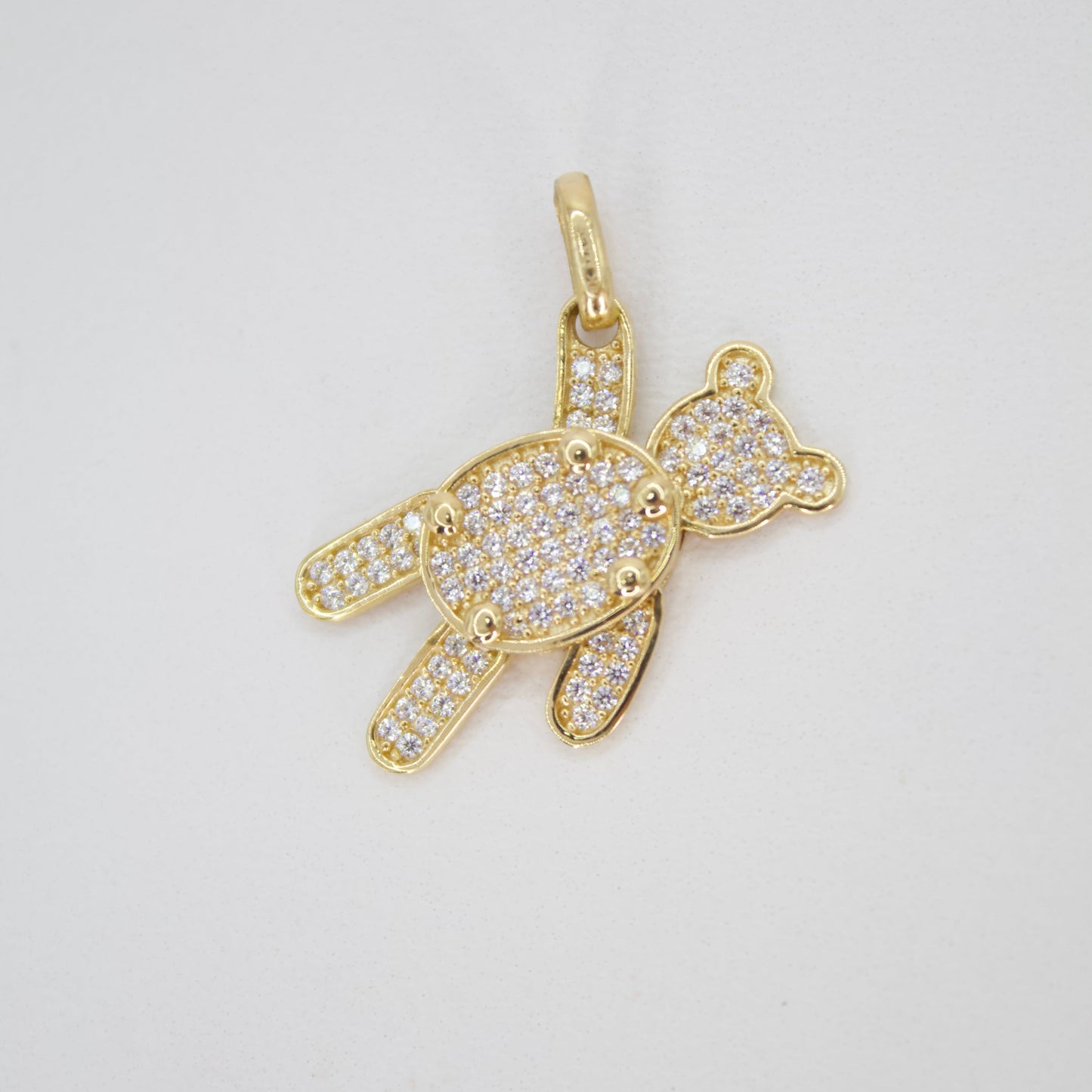 Dije oso en oro amarillo 14k con zirconias.