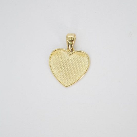 Dije corazón en oro amarillo 14k.