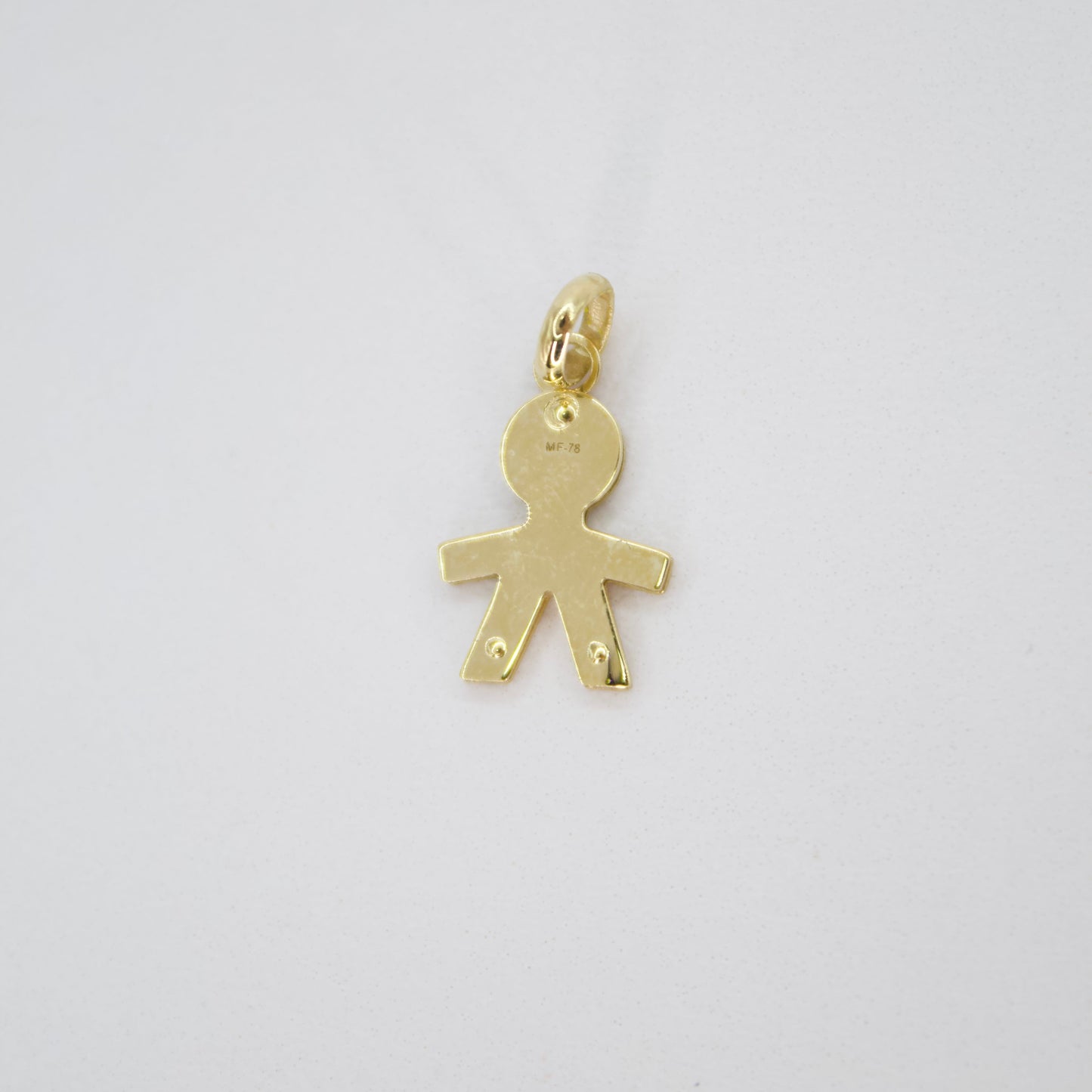 Dije Niño en oro amarillo 14k.